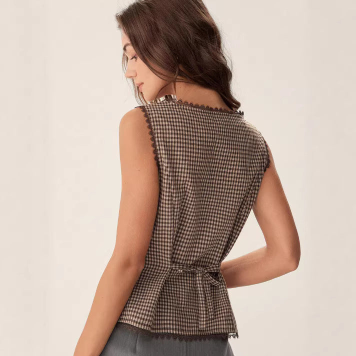 Close-up of clean hem finishing and button-down front detailing