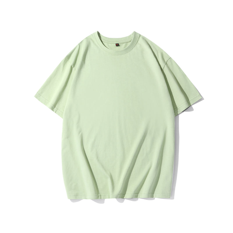 Detail of the classic crew neckline and ribbed collar on the green t-shirt