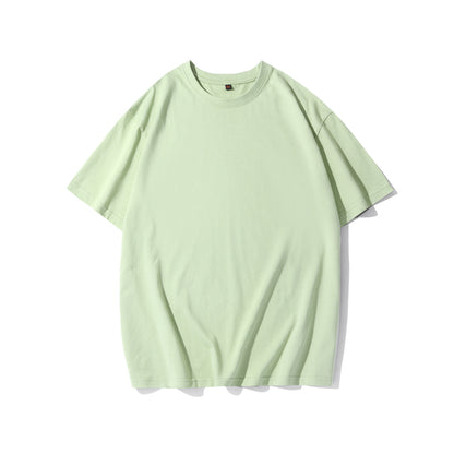 Detail of the classic crew neckline and ribbed collar on the green t-shirt