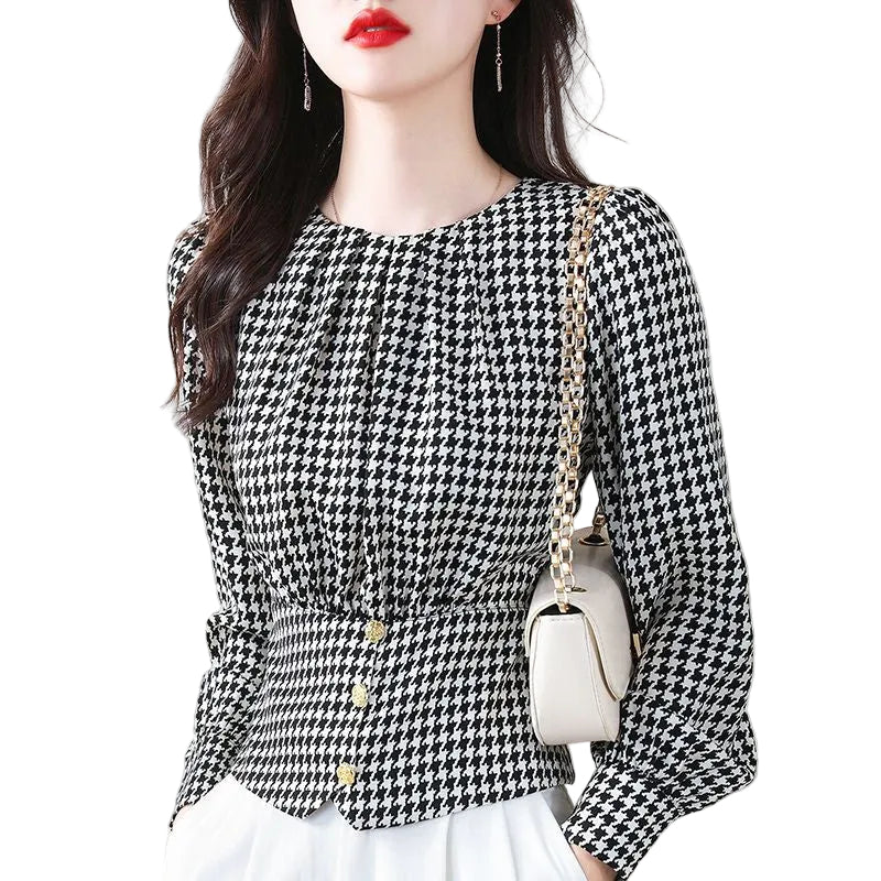 Side profile of a model wearing the Chanel-style houndstooth sleeveless top