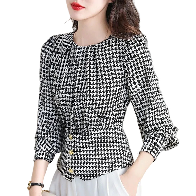 Flat lay styling of the women's luxury-inspired houndstooth pullover