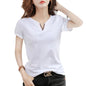 Close-up of the soft ribbed cotton fabric texture on the women's top