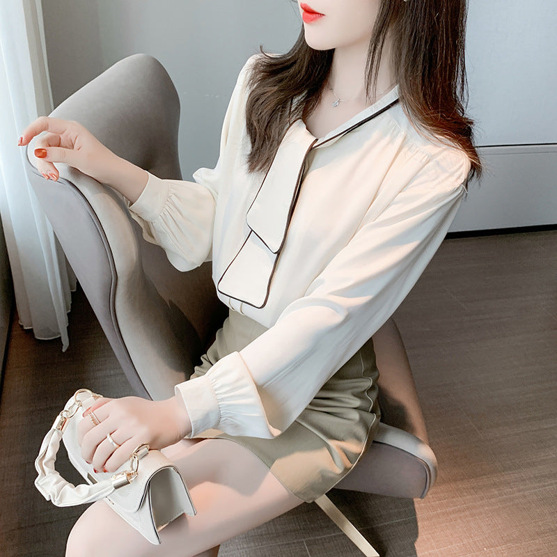Back view of the vintage loose chiffon cardigan with navy collar for women