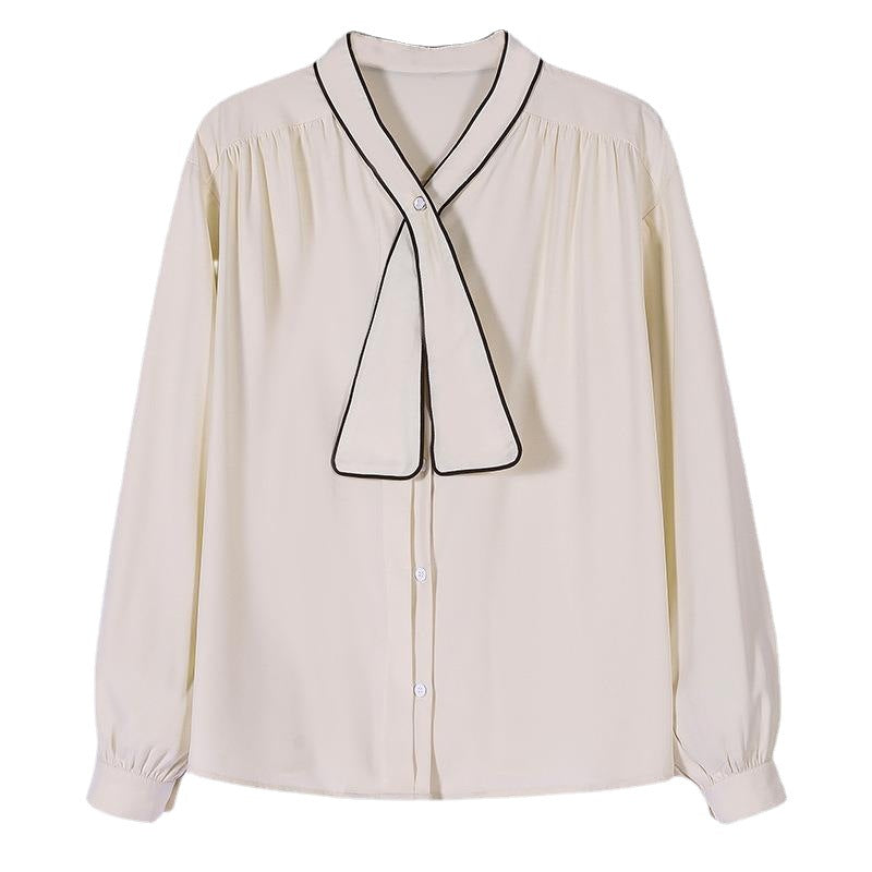Side profile of a model wearing the retro loose chiffon cardigan top