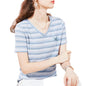 Close-up of the delicate butterfly embroidery detail on the t-shirt chest