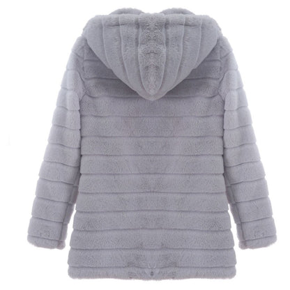 Detail of the oversized lapel collar and button closure on the long coat