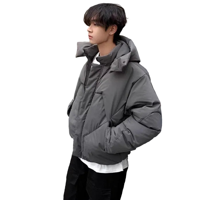 Side profile of a model wearing the loose-fit winter bread jacket